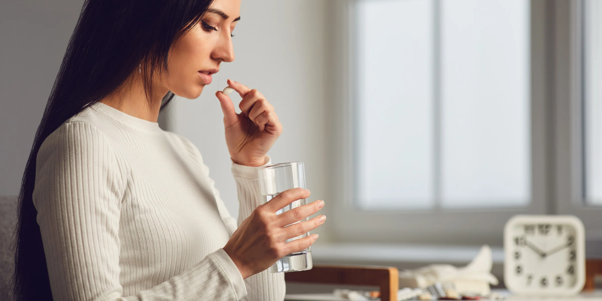 woman taking the abortion pill